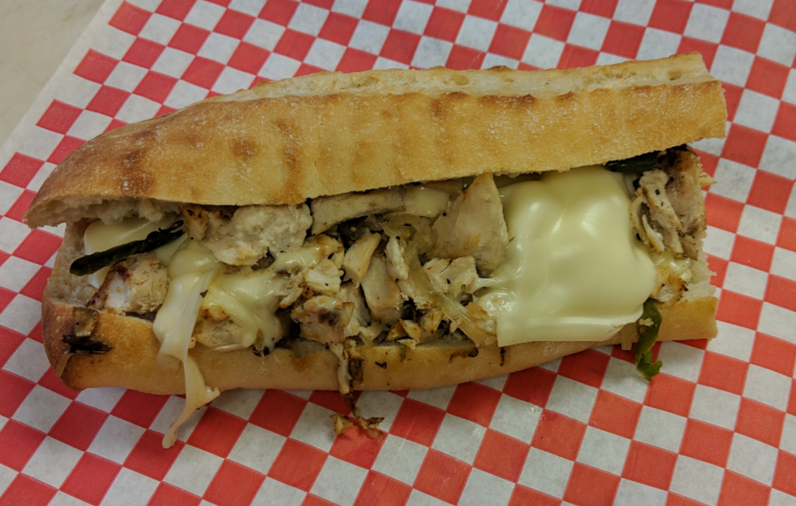 Order Chicken Cheesesteak food online from Marco Polo Cheesesteaks store, New Braunfels on bringmethat.com