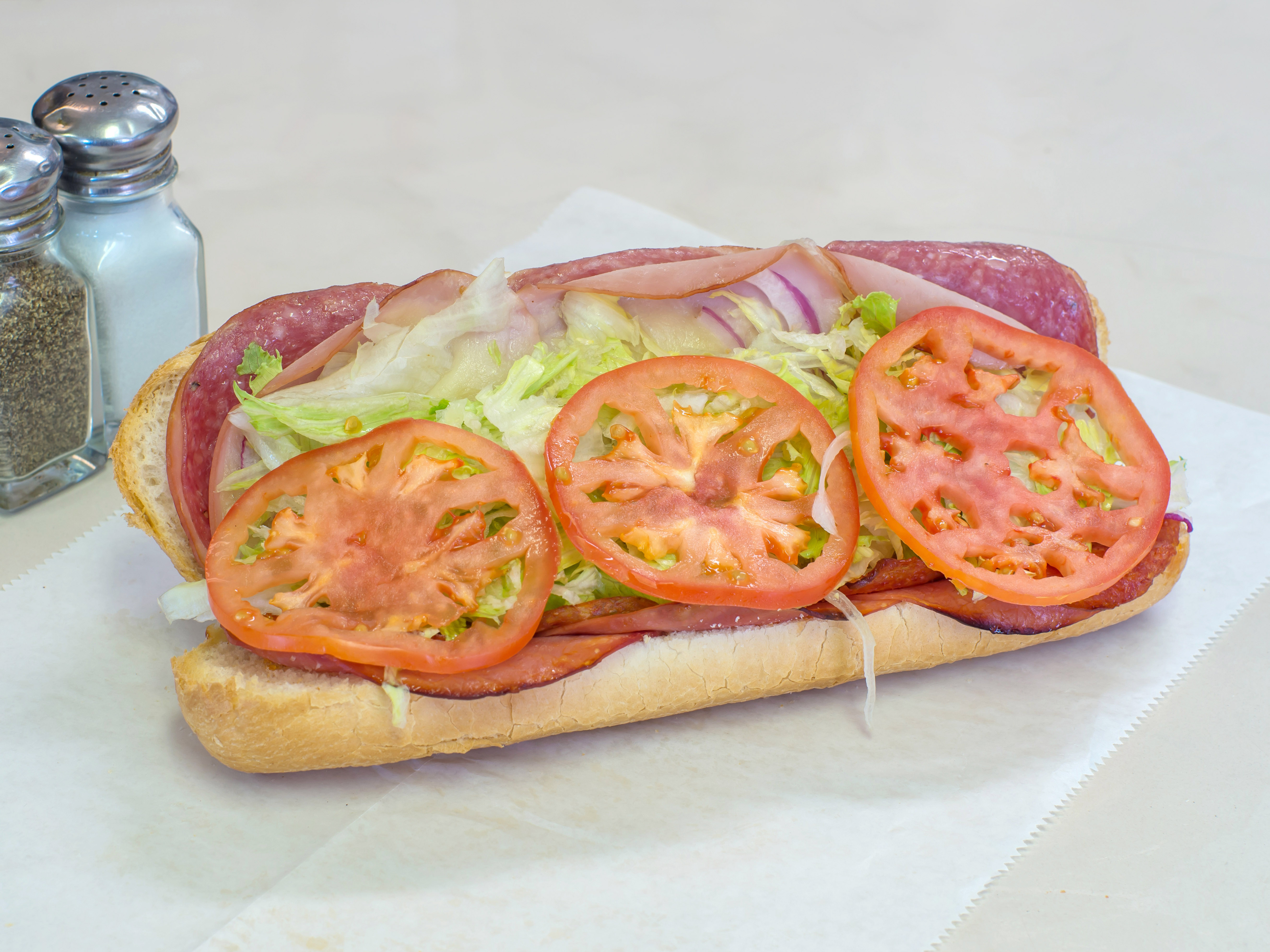 Order Italian Sub food online from Hot Box Pizza & Wings store, South Park Township on bringmethat.com