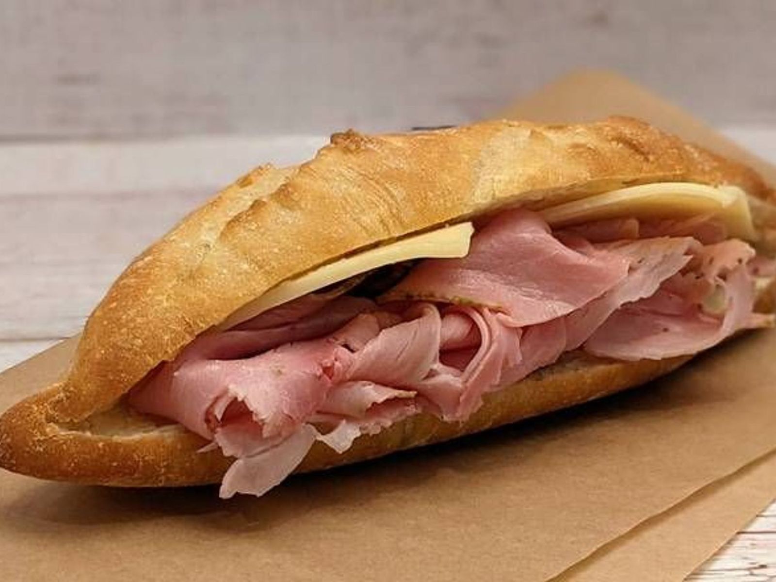 Order Ham and Cheese Baguette food online from Caffe Nero store, Beverly on bringmethat.com