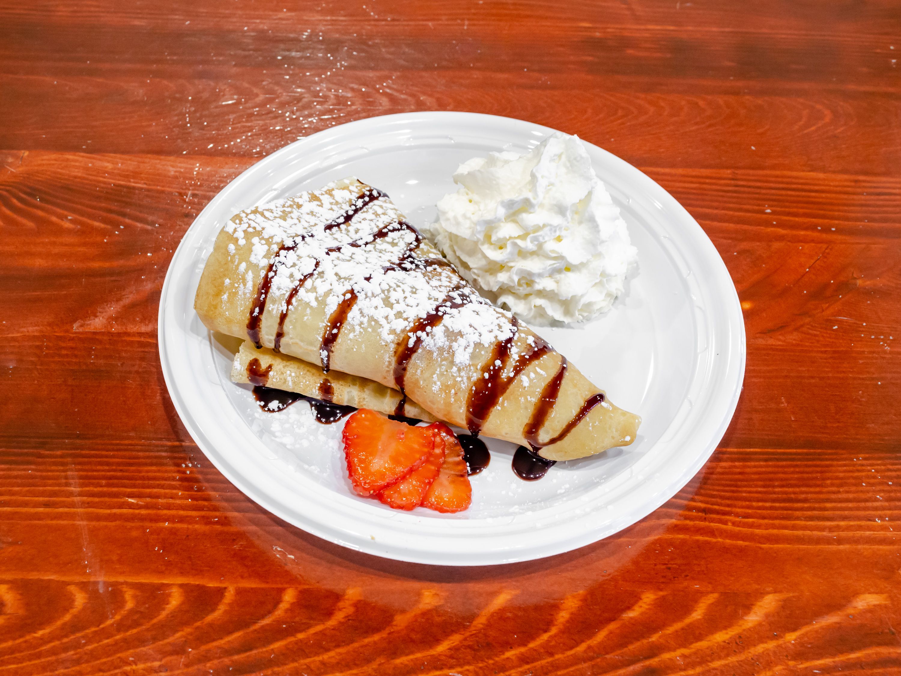 Order Nutella Strawberry Crepe food online from House Of Crepes store, Rutherford on bringmethat.com