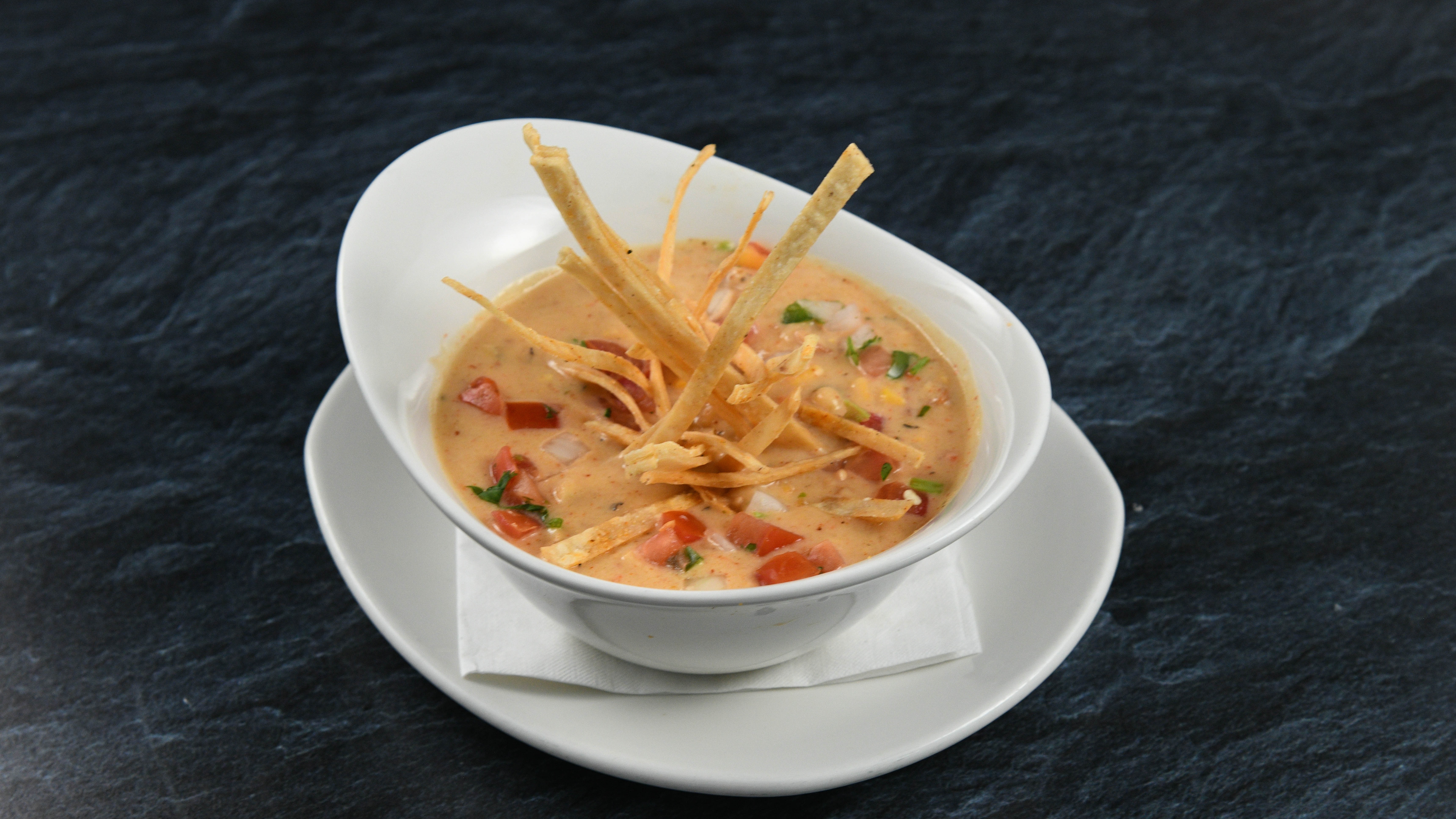 Order Soup of the Day food online from Rainforest Cafe store, Tempe on bringmethat.com