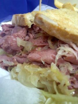Order Reuben Sandwich with Fries food online from Scalpers Bar & Grille store, Lyndhurst on bringmethat.com