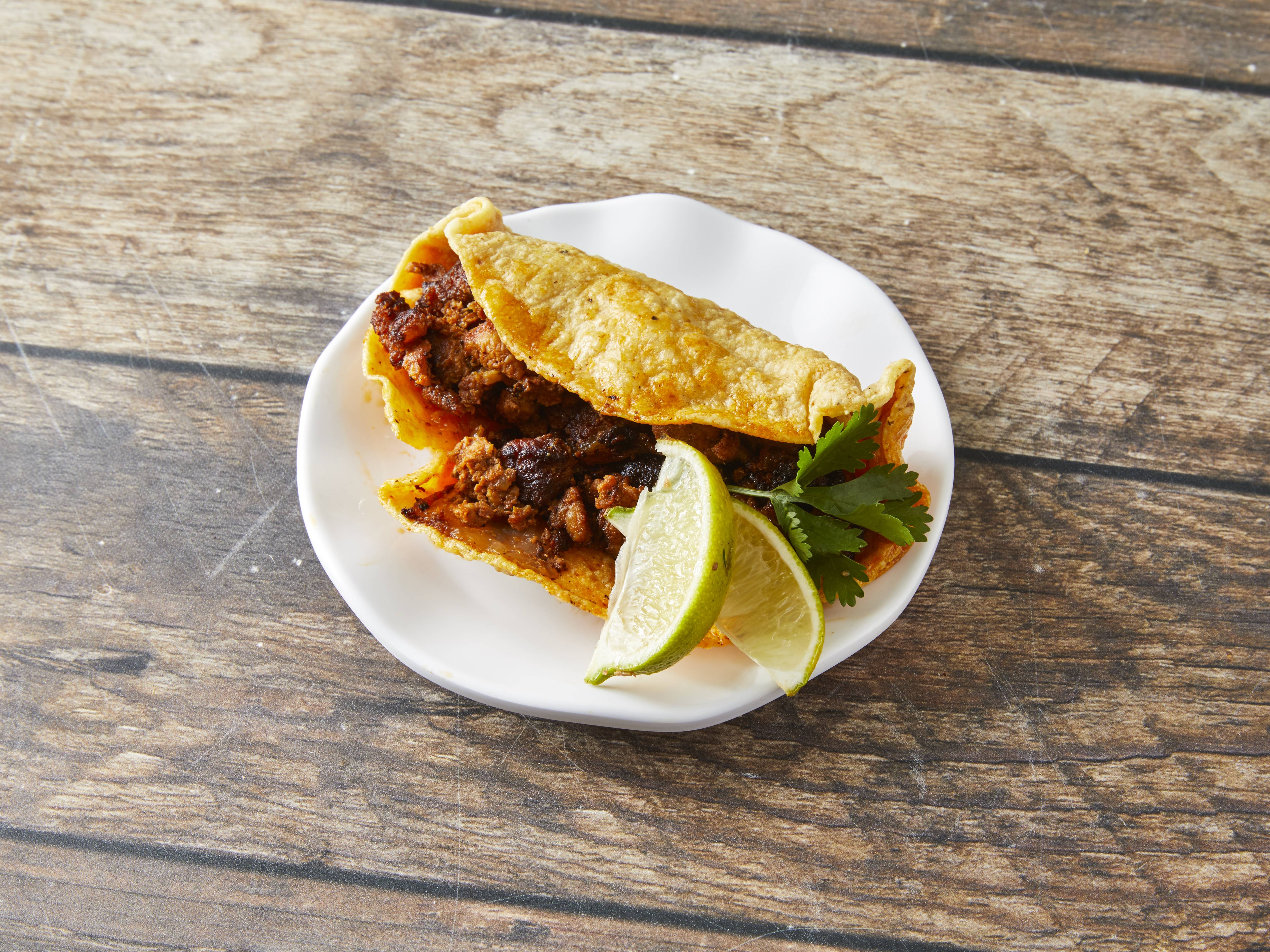 Order Al Pastor Taco food online from Simon Tacos store, Chicago on bringmethat.com