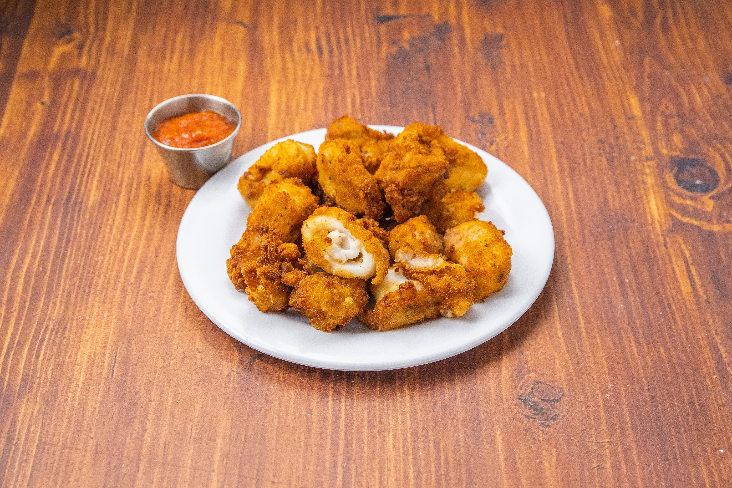 Order Fried Calamari food online from E Che Pizza store, Los Angeles on bringmethat.com