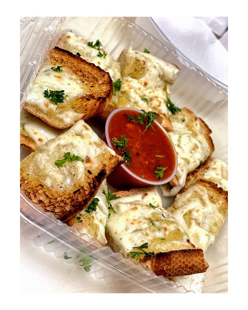 Order Garlic Bread with Cheese - Appetizer food online from Mano's Pizza store, Annandale on bringmethat.com
