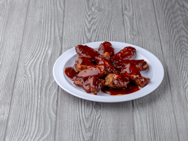Order BBQ Hot Wings food online from Deno's Pizza & Italian store, Long Beach on bringmethat.com
