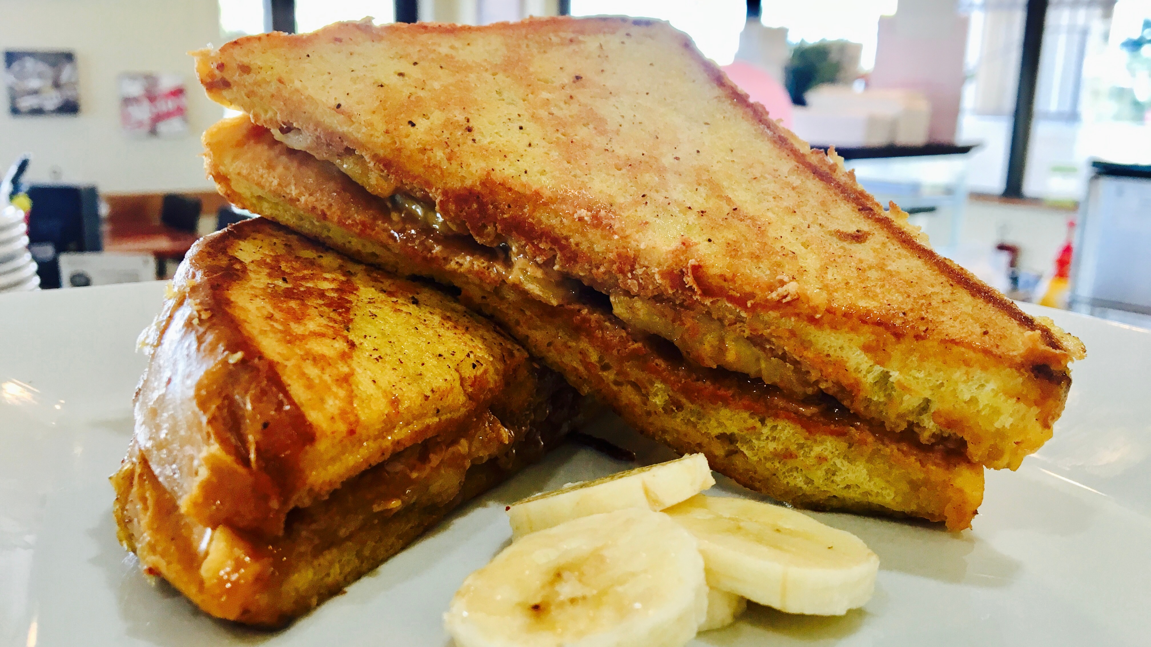 Order Peanut Butter & Banana Stuffed French Toast food online from Old Town Cafe store, Camarillo on bringmethat.com