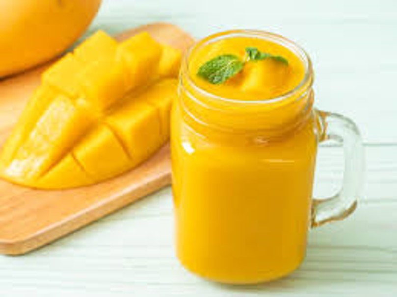 Order Mango Smoothie food online from Karmale Cafe store, Charlotte on bringmethat.com