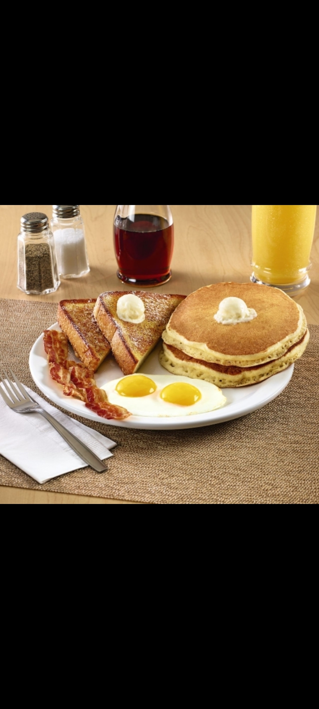 Order Eggs Pancakes French Toast & Bacon Platter (two eggs two pancakes two french toast  bacon & your choice of potatoes)) food online from American Gourmet Foods Deli store, New York on bringmethat.com