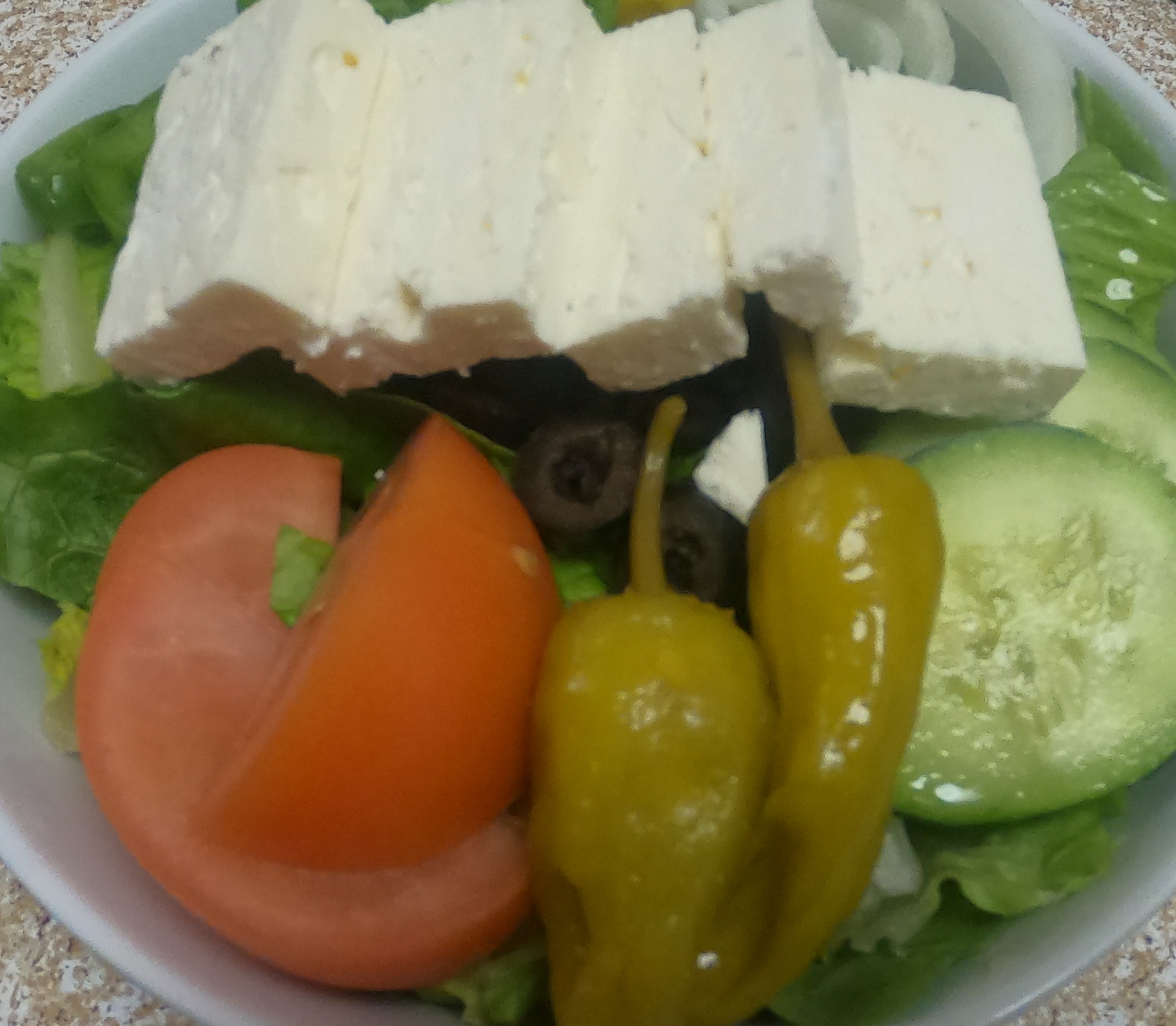 Order Greek - Salad food online from Pizza Seven store, Houston on bringmethat.com