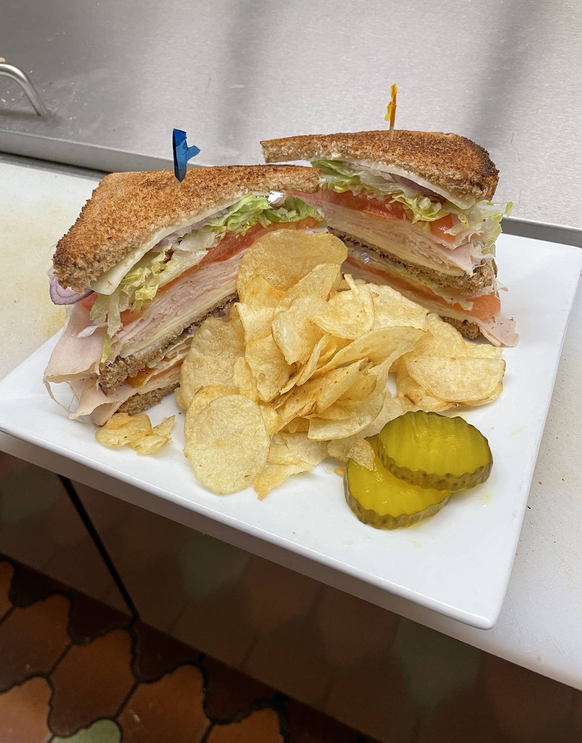 Order Turkey Club Sandwich food online from Dino Italian Restaurant store, Wilkes-Barre on bringmethat.com