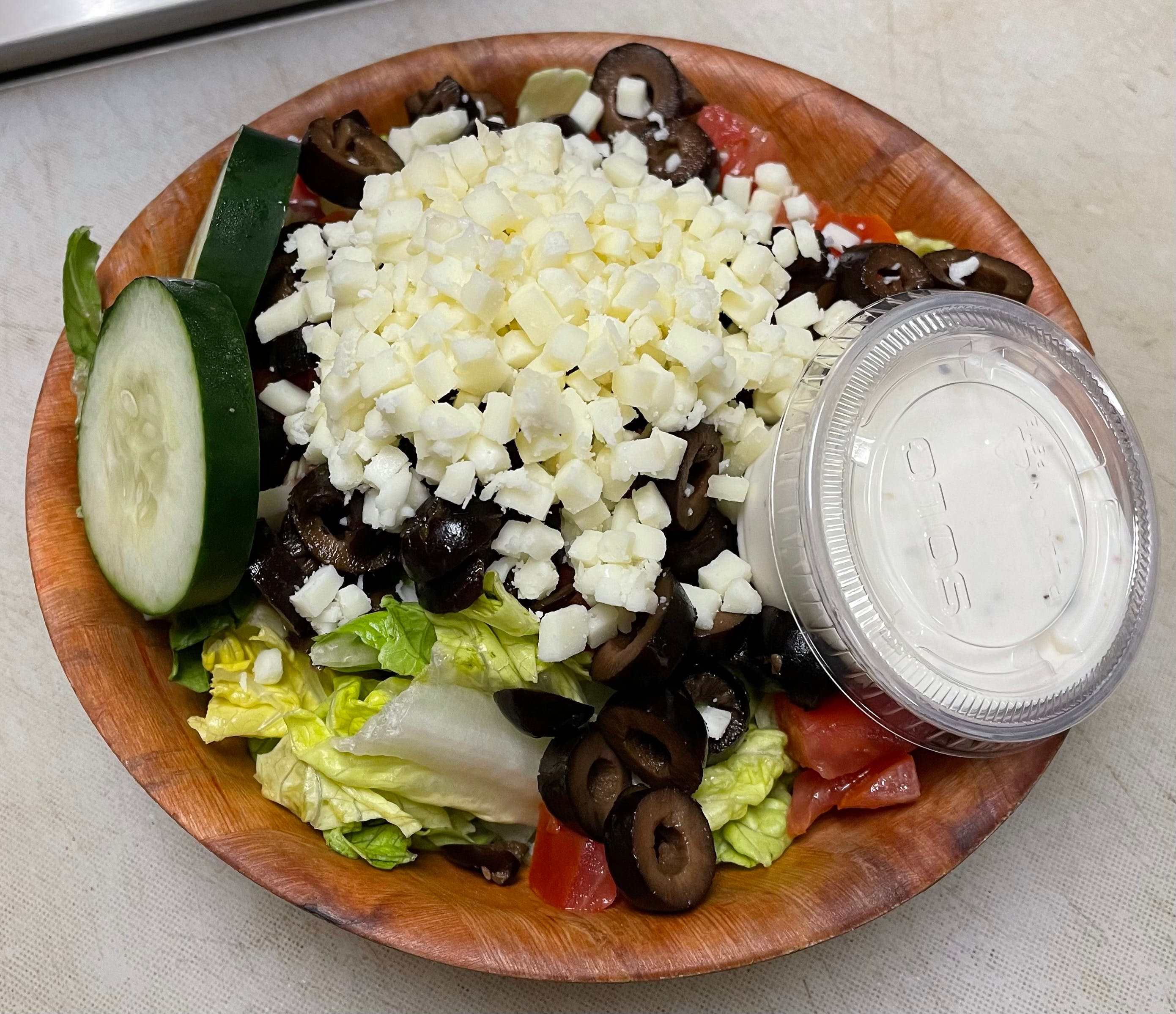 Order Tossed Salad - Regular food online from Brooklyn Pizza & Pasta store, Cincinnati on bringmethat.com