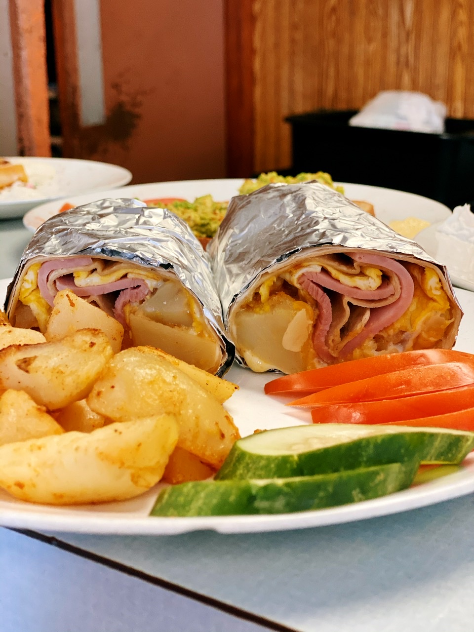Order Breakfast Wrap with Egg, Meat and Home Fries Combo food online from Gold Star Restaurant store, Roswell on bringmethat.com