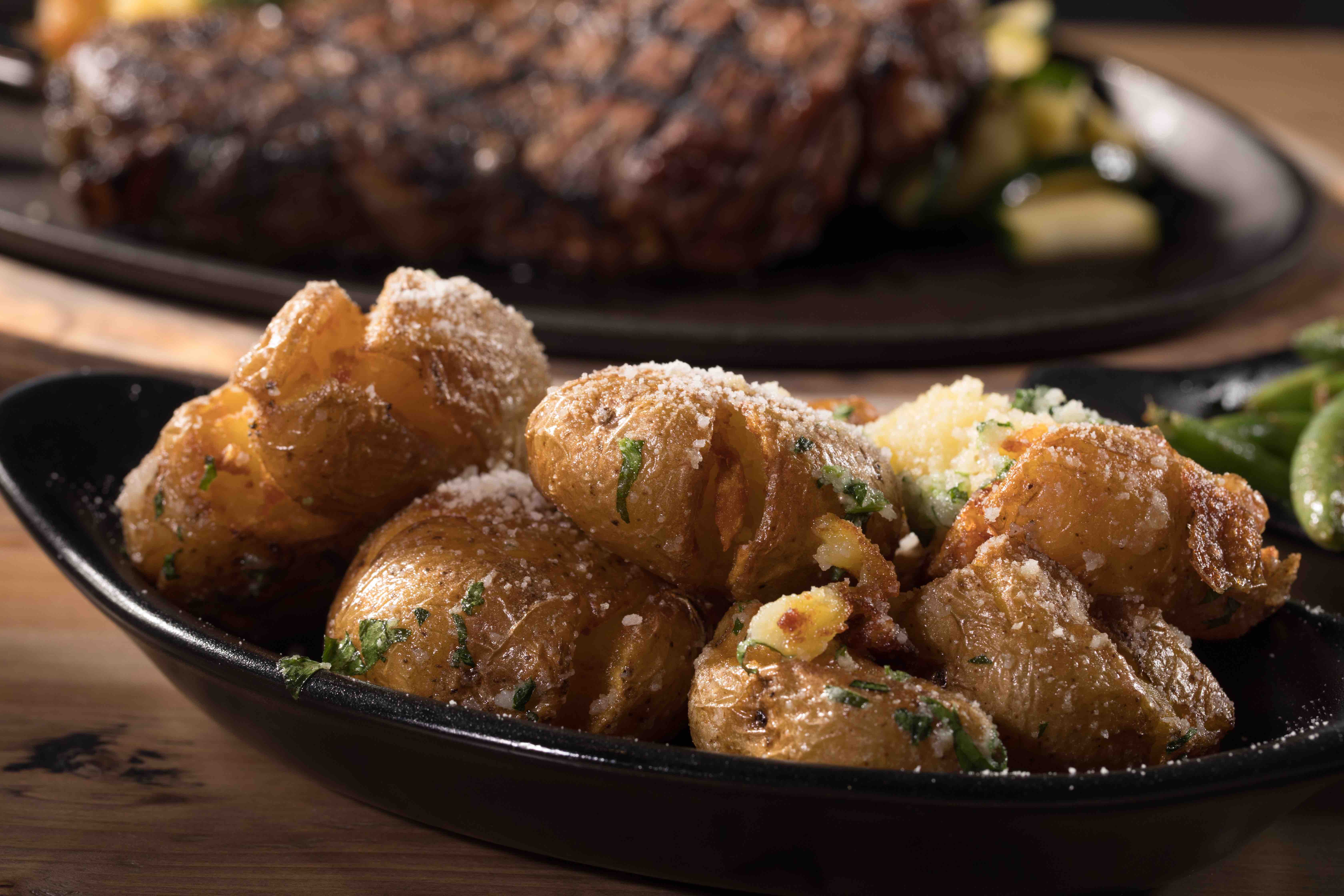 Order Roasties English Style Roast Potatoes food online from Green St. Grille store, Bensenville on bringmethat.com