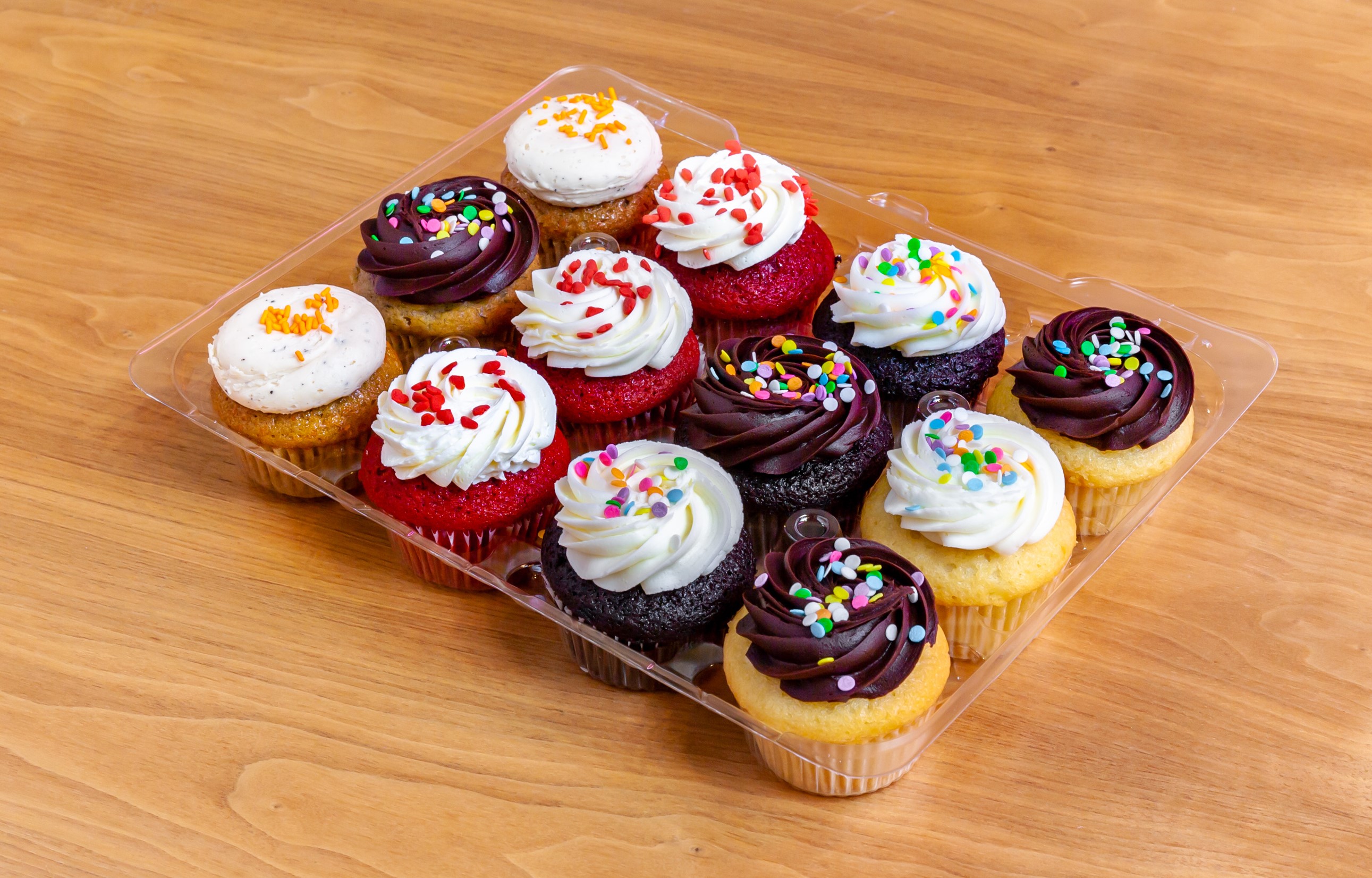 Order 1 Dozen Assorted Molly's Cupcakes food online from Molly's Cupcakes store, Chicago on bringmethat.com