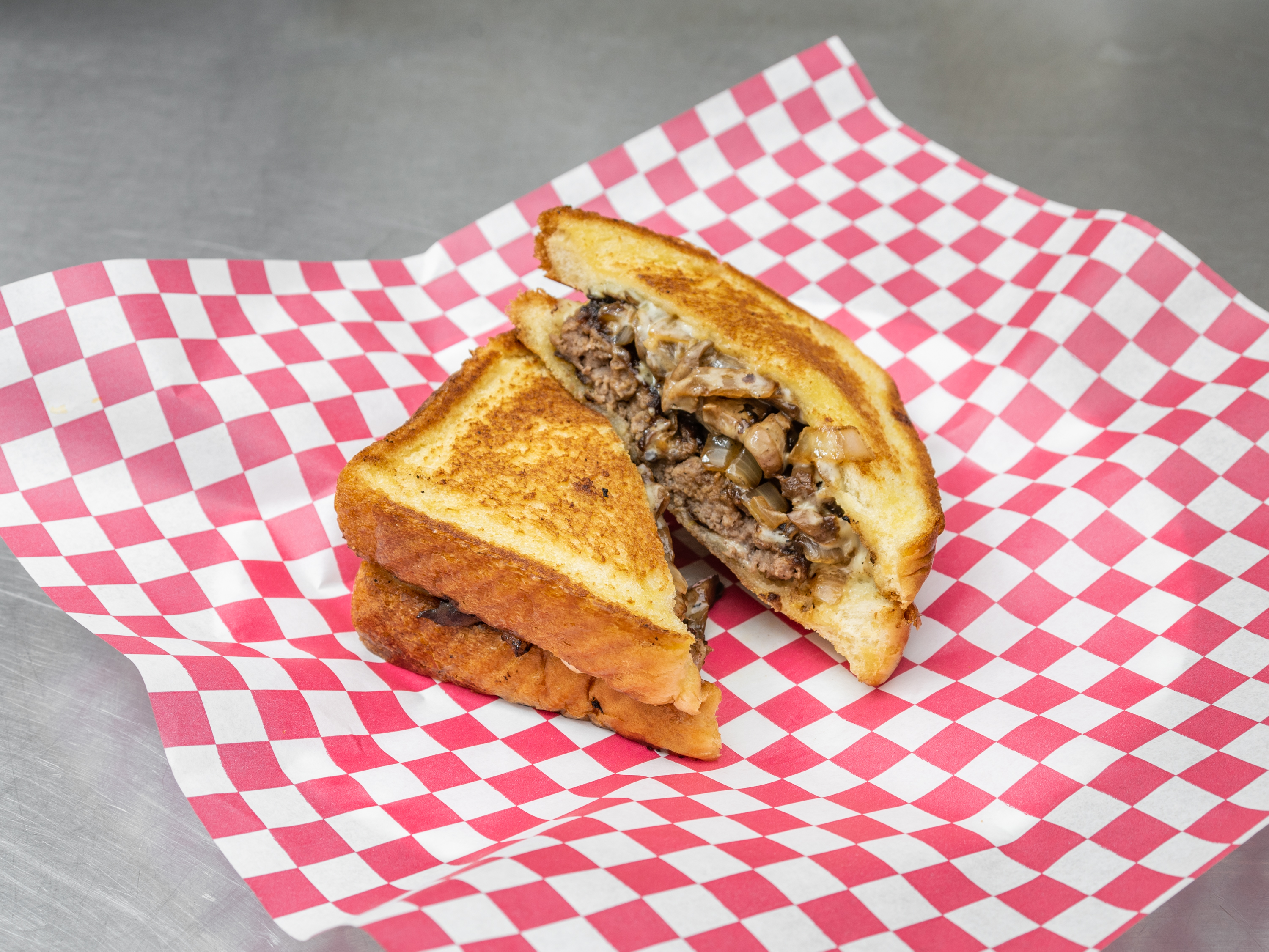 Order Patty Melt food online from Flames Grill- 1258 Eastdale Cir store, Montgomery on bringmethat.com