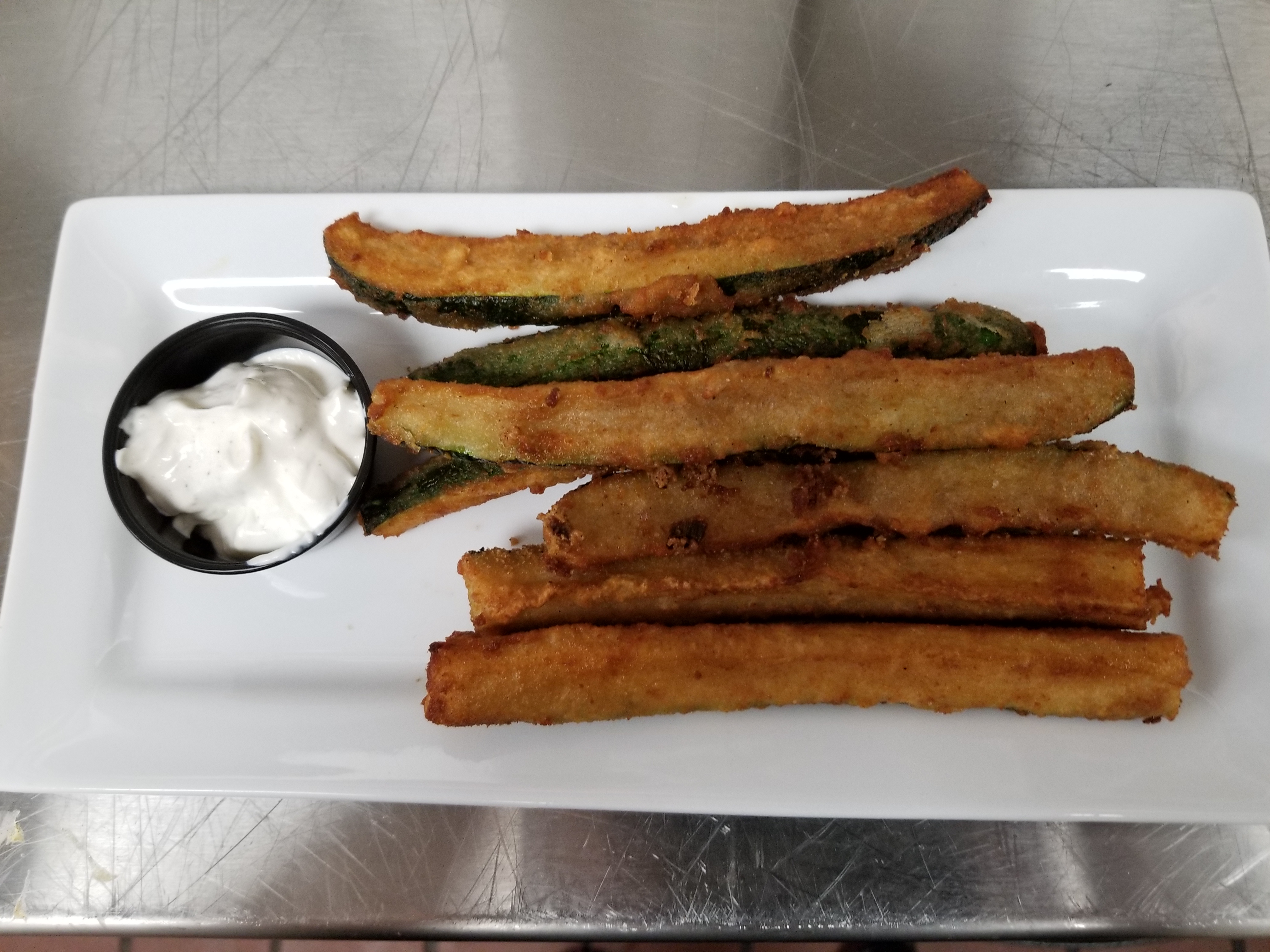 Order Fried Zucchini food online from On Tap Grille And Bar store, Cuyahoga Falls on bringmethat.com