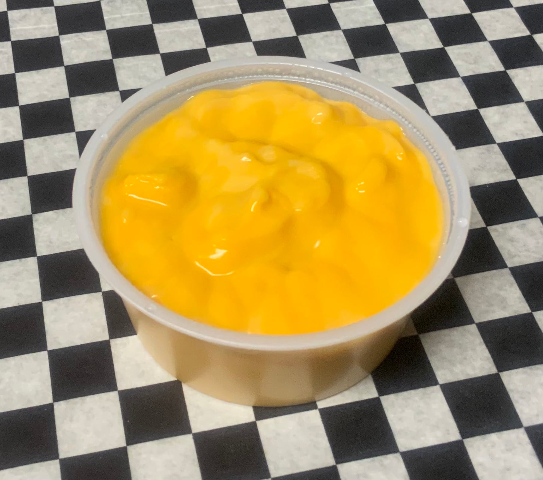Order Side of Nacho Cheese - Side food online from Whatinthe Sam Hills Brick Oven Pizza store, Wilkes-Barre on bringmethat.com