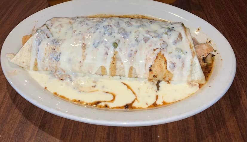 Order 32. Hot and Spicy Burrito food online from El Gordito Mexican Restaurant store, Belleville on bringmethat.com