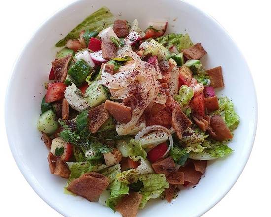 Order Fattoush food online from American Falafel store, St Louis on bringmethat.com