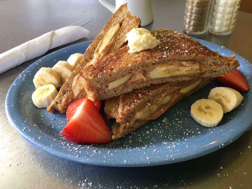 Order Peanut Butter and  Banana Stuffed French Toast food online from Cafe 222 store, San Diego on bringmethat.com