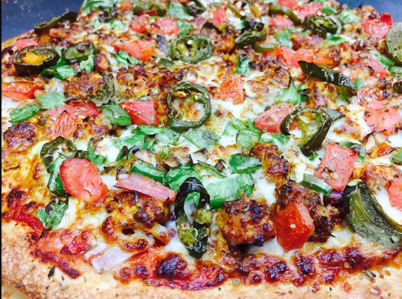 Order Karahi Chicken Pizza - Medium 12" food online from Can Am Pizza store, Federal Way on bringmethat.com