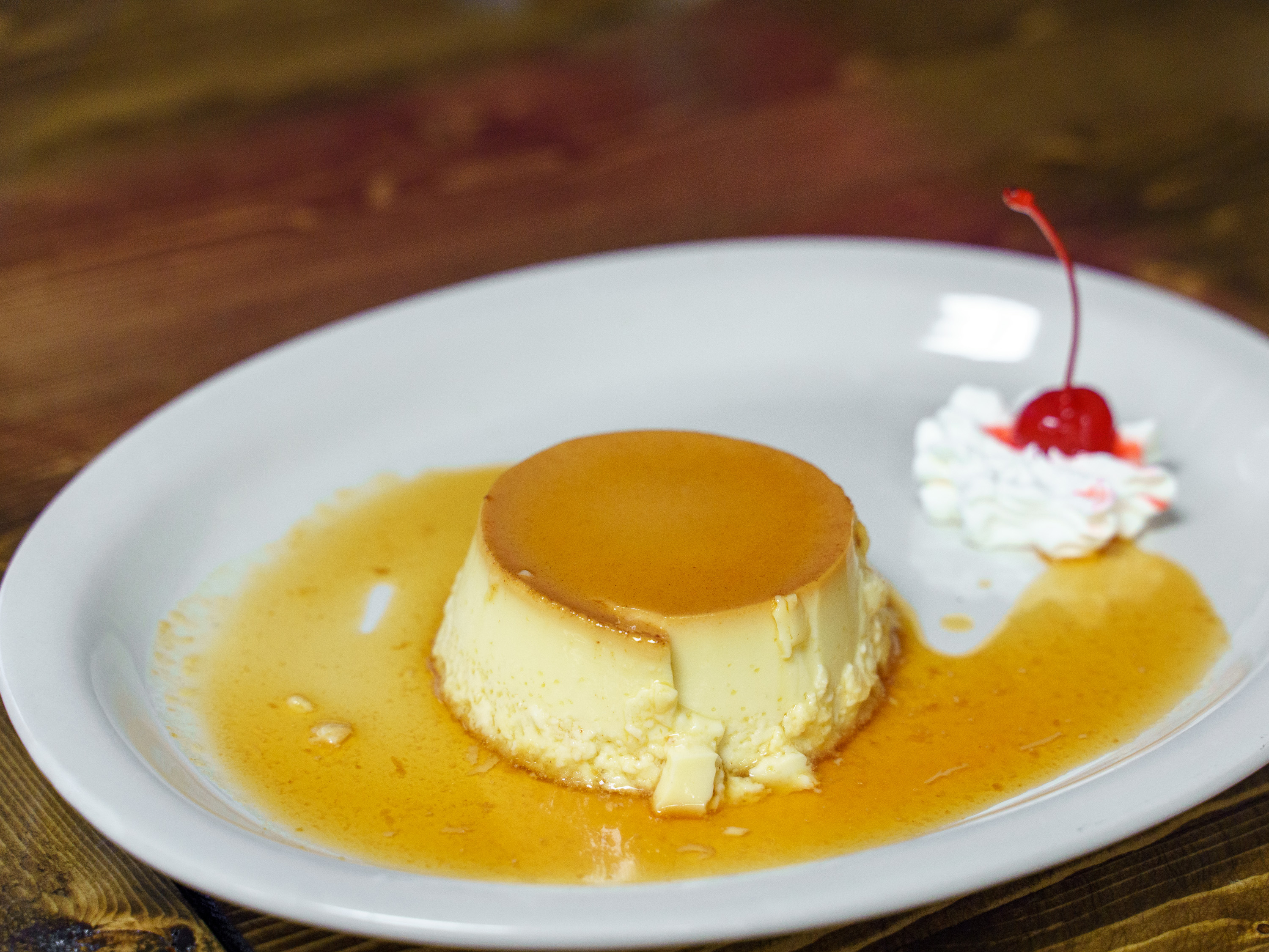 Order Flan food online from Porton Mexican Kitchen store, Knoxville on bringmethat.com
