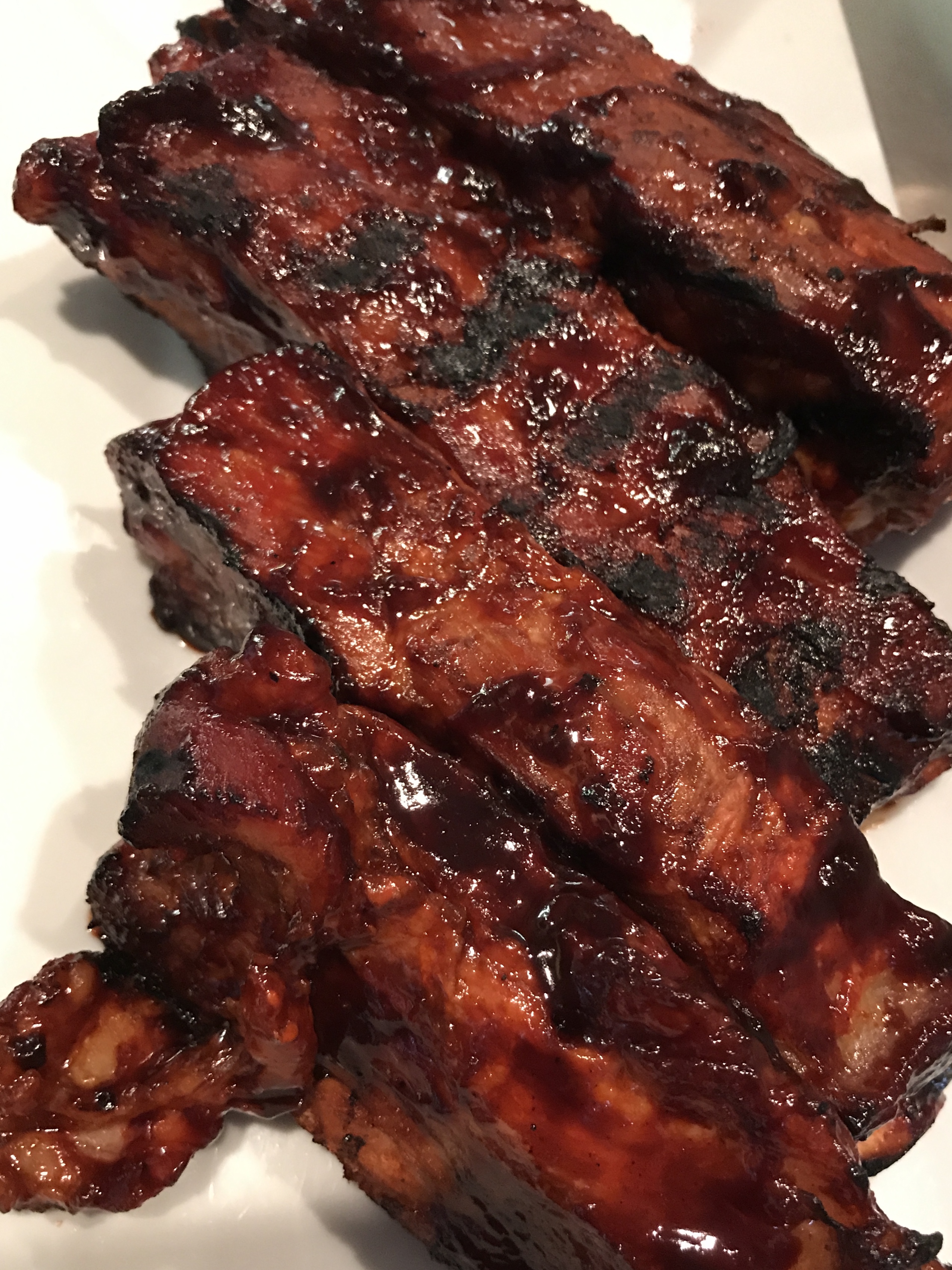 Order A11. 4 Barbecue Ribs food online from August Moon store, New Orleans on bringmethat.com