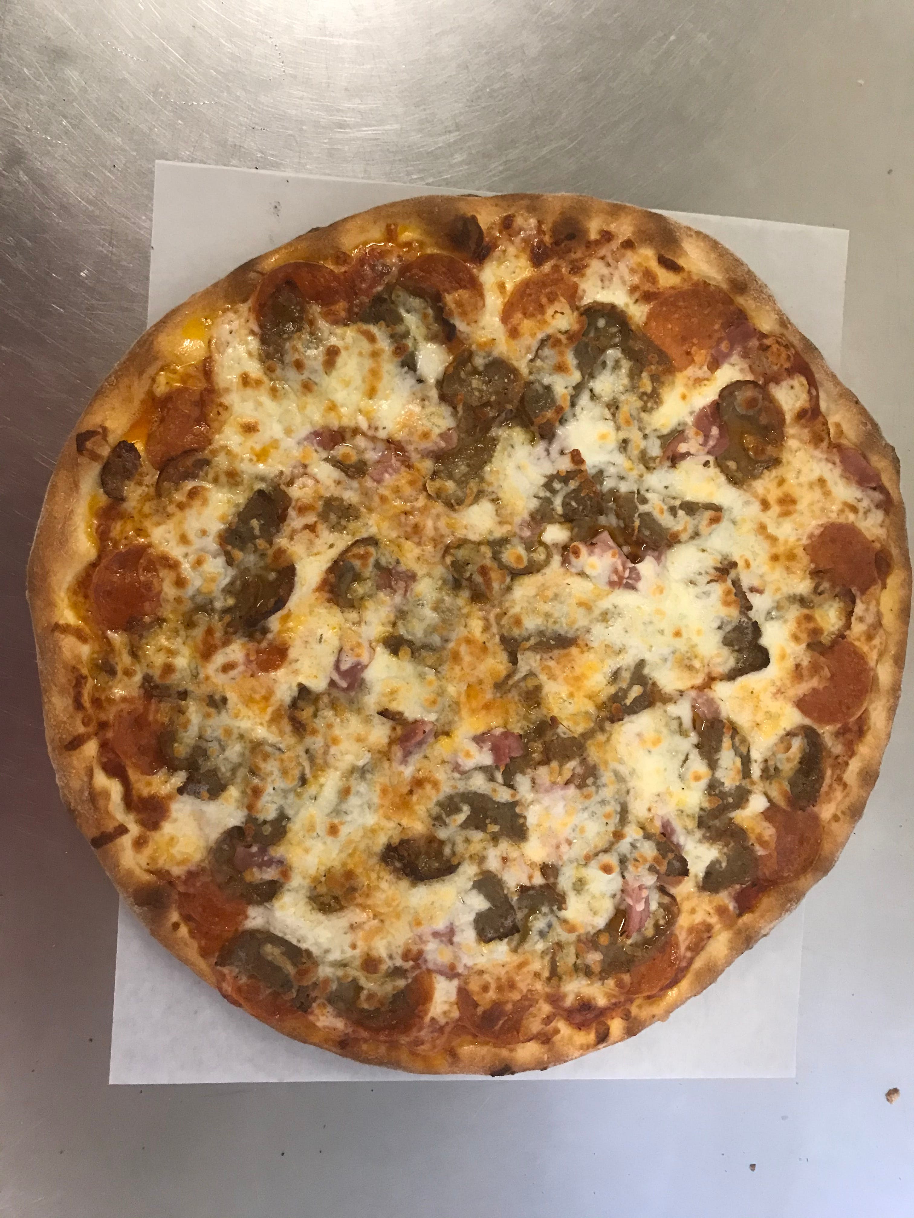 Order Meat Lovers Pizza - Medium 12'' (6 Slices) food online from Ben's Pizza store, Surprise on bringmethat.com