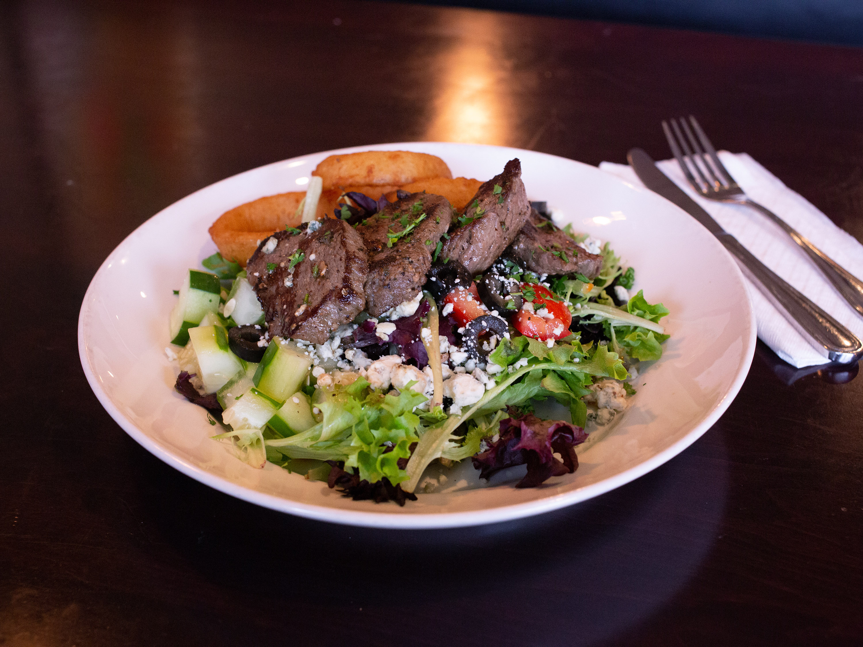 Order Steak Tip Salad food online from Vito's Pizza Bar & Grill store, Amherst on bringmethat.com