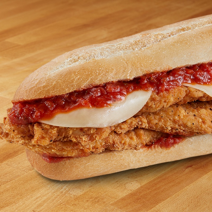Order Hot Chicken Cutlet Parmigiana Sandwich food online from Gino's Pizza and Luncheonette store, Belleville on bringmethat.com