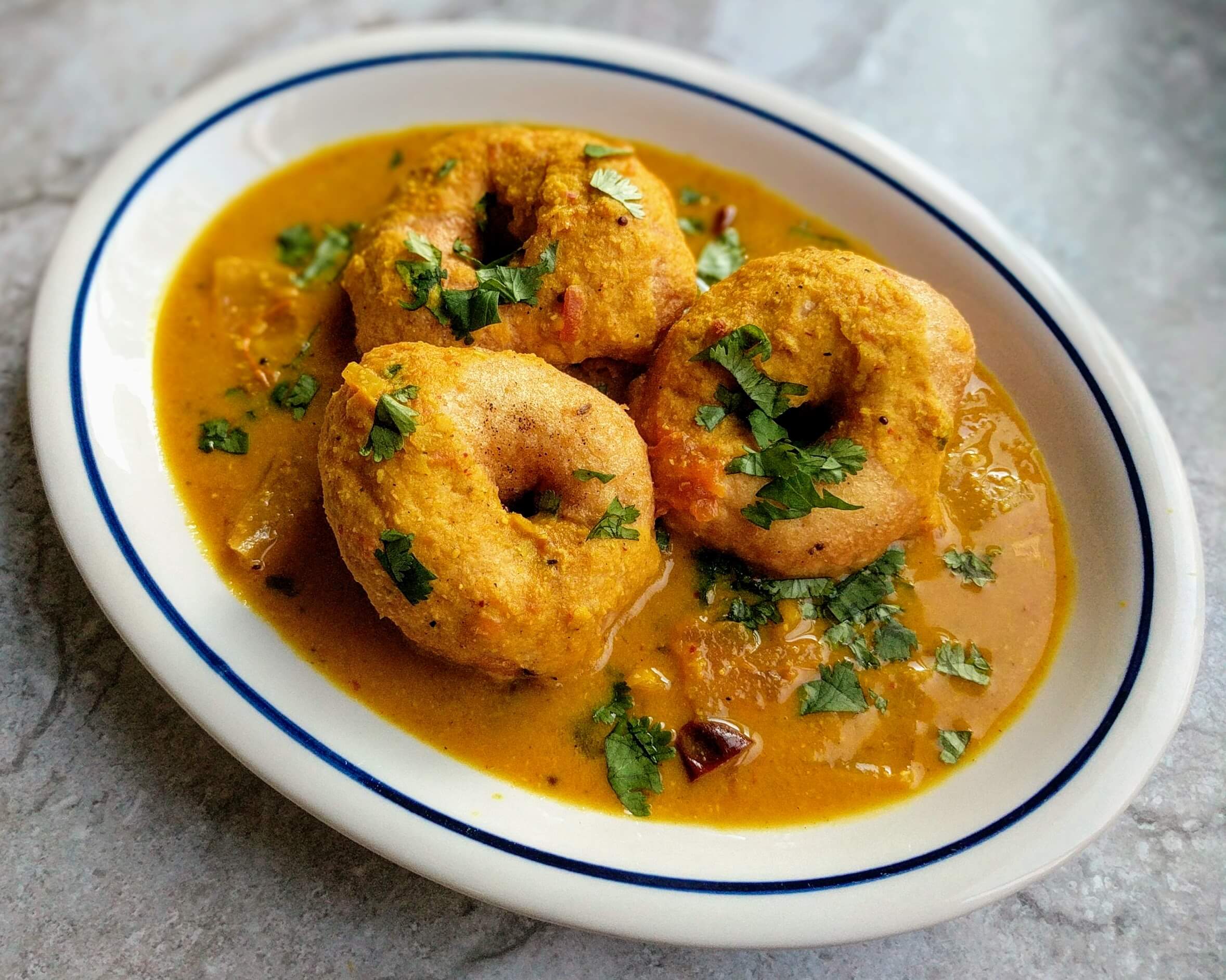 Order Sambar Vada (4pcs) food online from Chef of India store, Jersey City on bringmethat.com