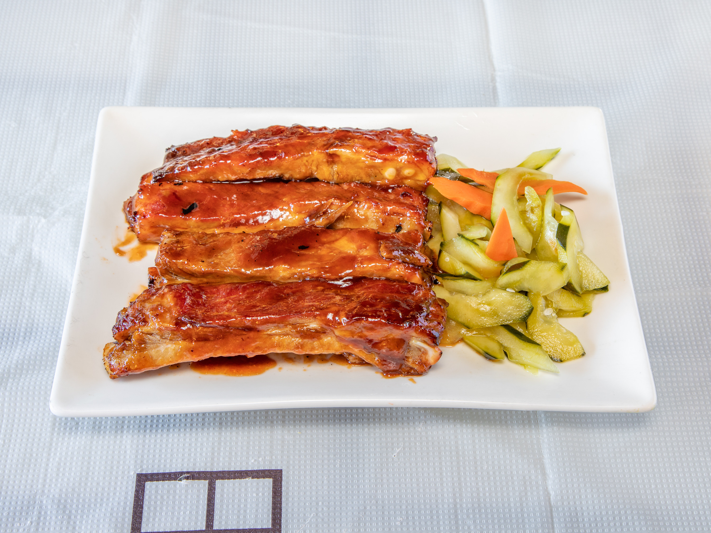 Order Roasted BBQ Ribs food online from Bamboo Cafe store, Glendale on bringmethat.com