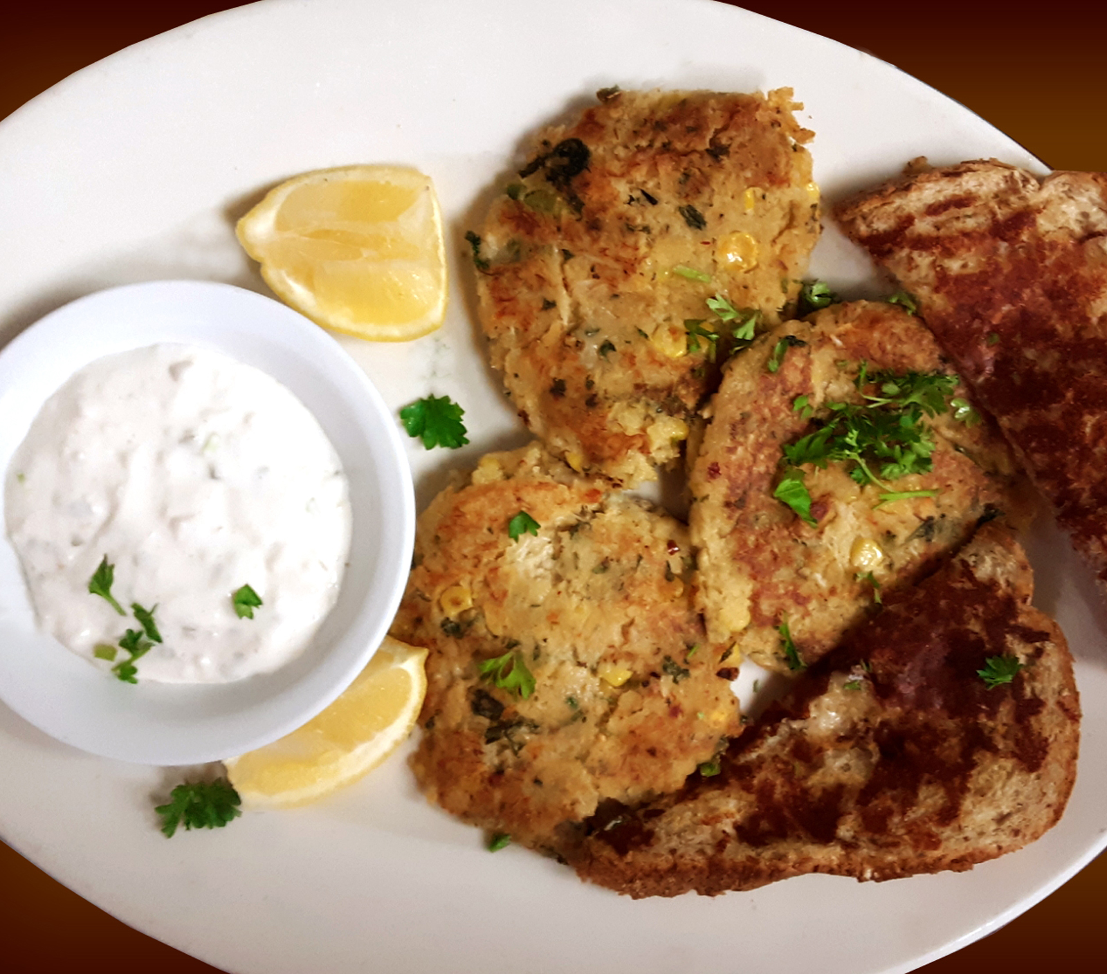 Order 2 Crab Cakes food online from Pinocchio In The Desert store, Palm Springs on bringmethat.com