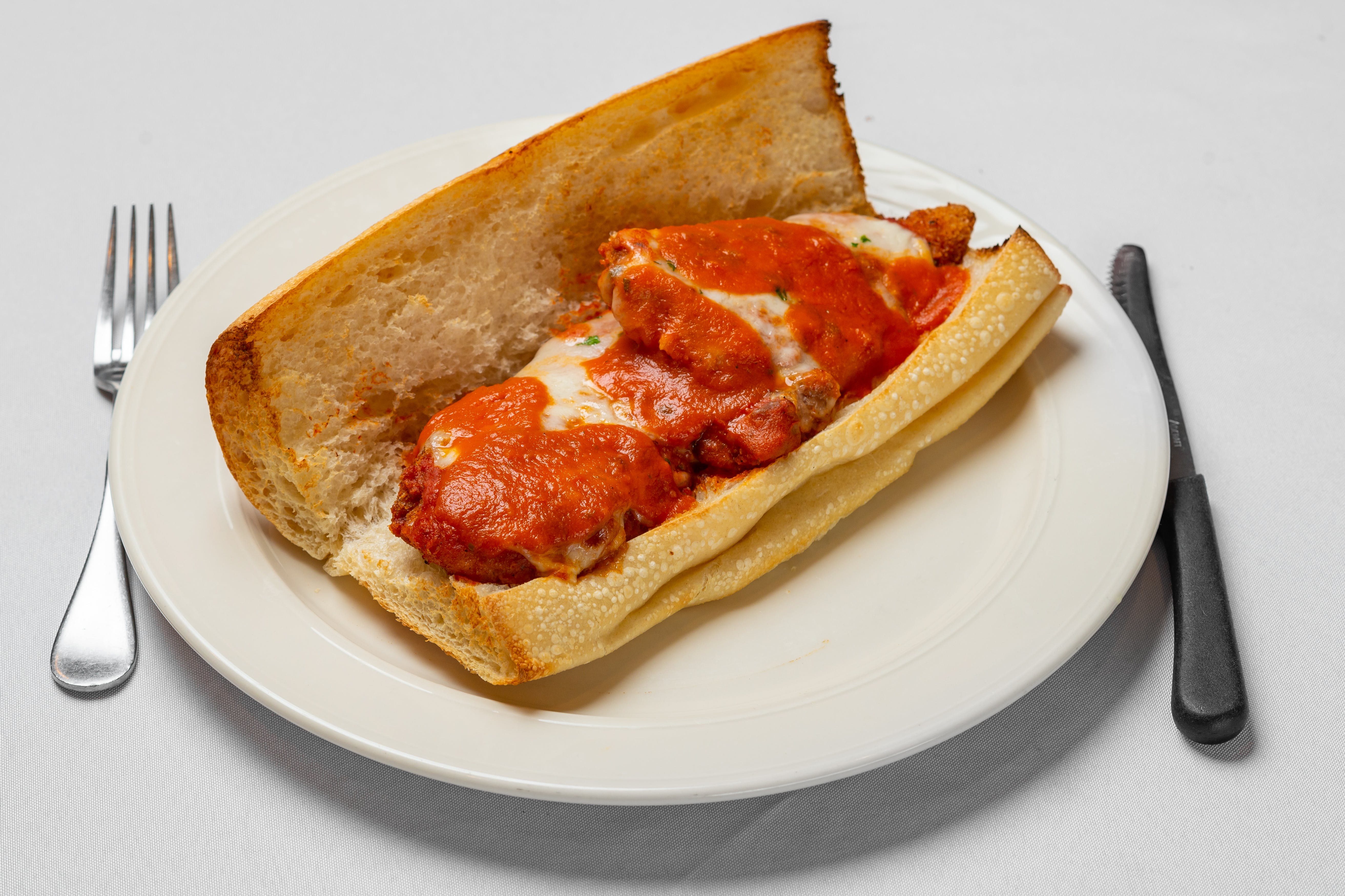 Order Chicken Parmigiana Sub with French Fries - 10'' food online from Pasquale Brick Oven Pizza store, Milltown on bringmethat.com