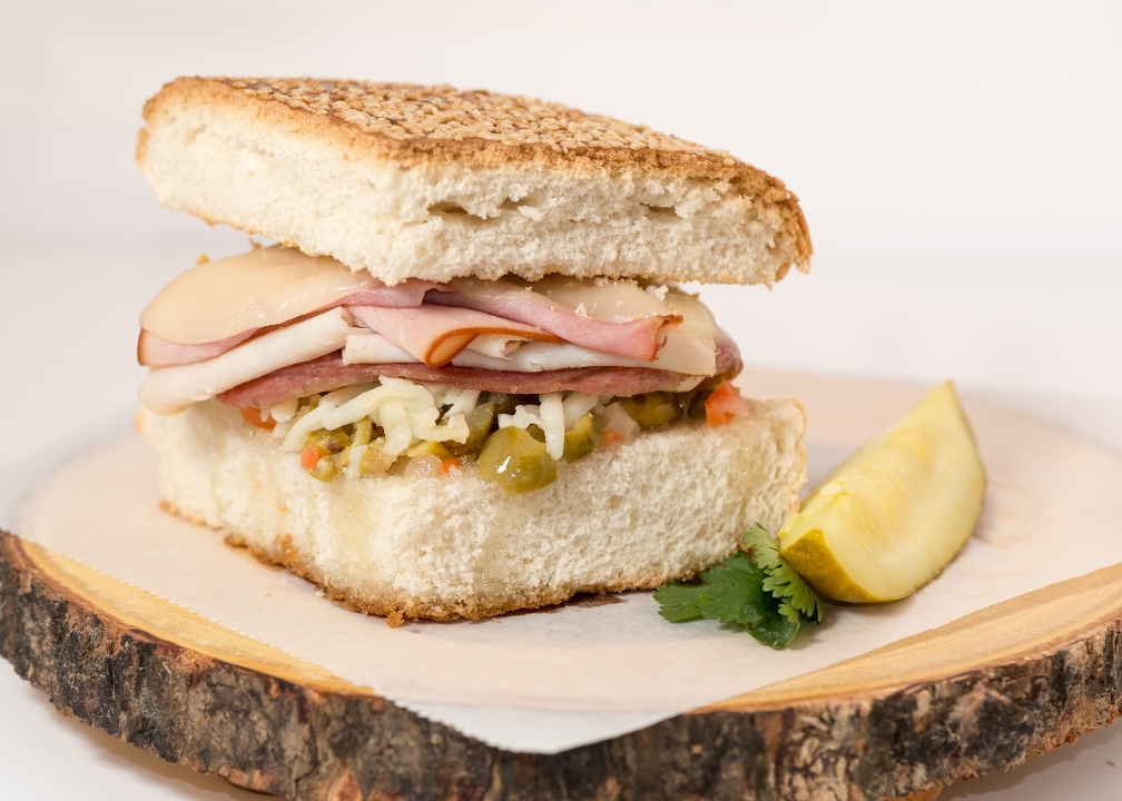 Order Muffuletta food online from High Tower Cafe store, Houston on bringmethat.com
