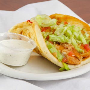Order Chicken Fingers Pita (540 cal) food online from Leo Coney Island store, Shelby Charter Township on bringmethat.com