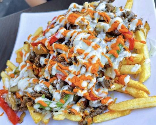 Order Philly Steak Fries food online from World Famous Grill store, Bell on bringmethat.com