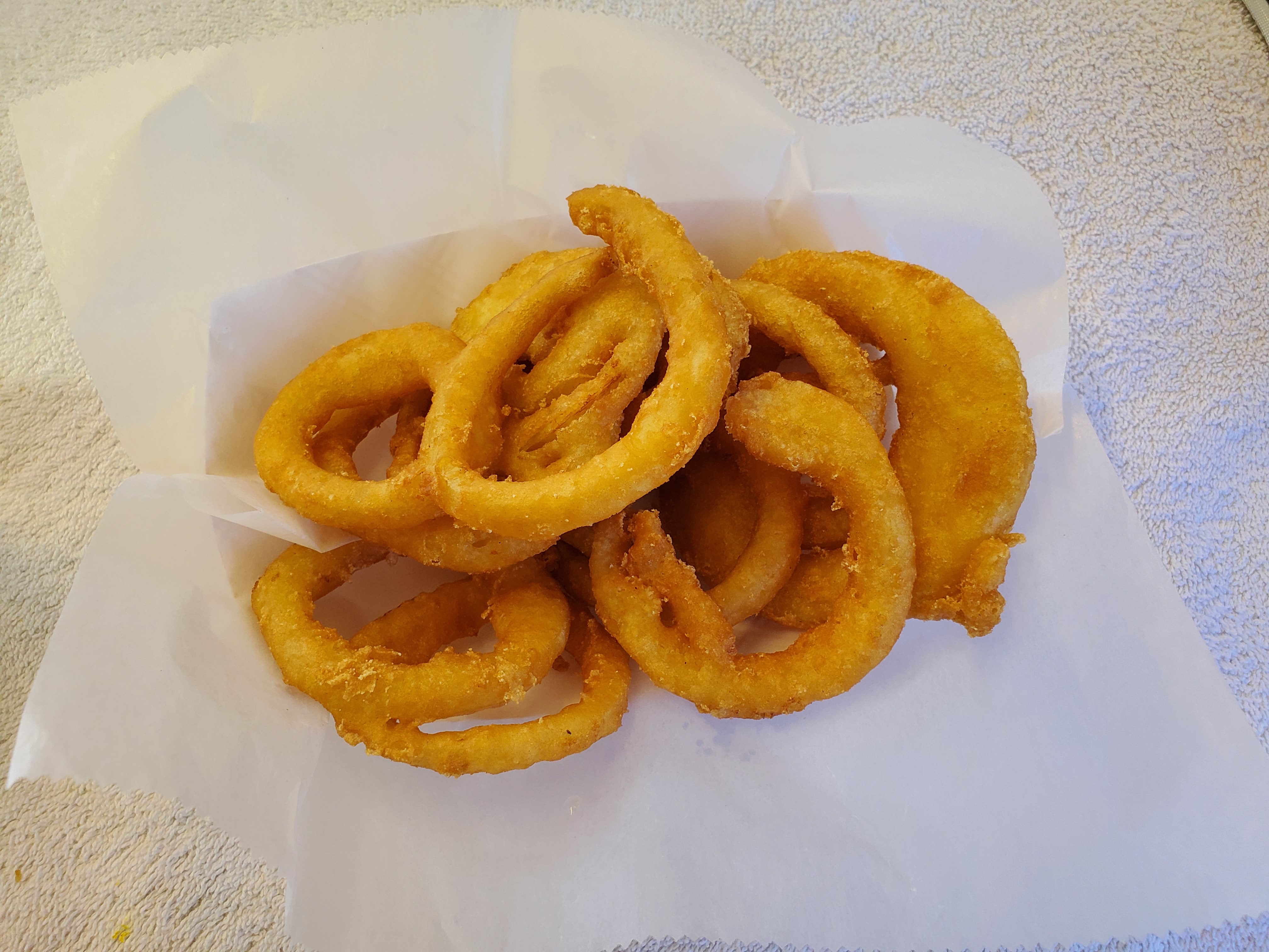Order Onion Rings food online from Shanes Hot Dogs store, Gardner on bringmethat.com