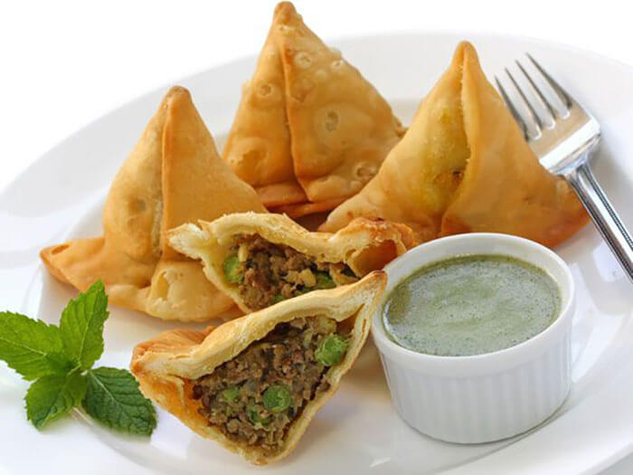 Order Meat Samosa (2) food online from Royal Kitchen store, Cockeysville on bringmethat.com