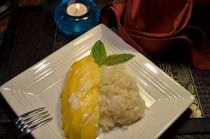 Order D1. Sticky Rice with Mango (Seasonal) food online from Siam Terrace store, Urbana on bringmethat.com