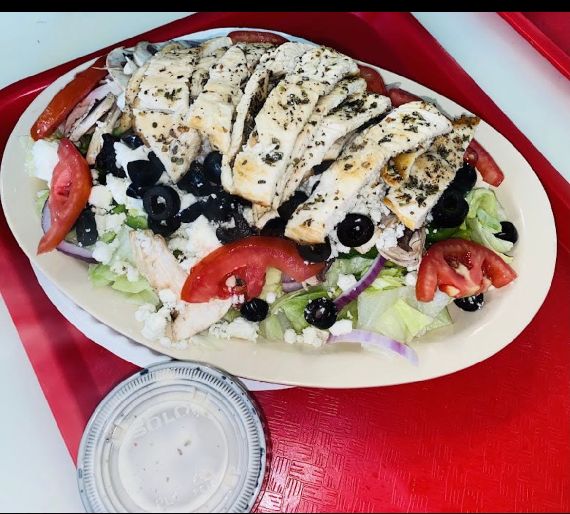 Order Greek Salad - Salad food online from Pizza Mania store, Norcross on bringmethat.com