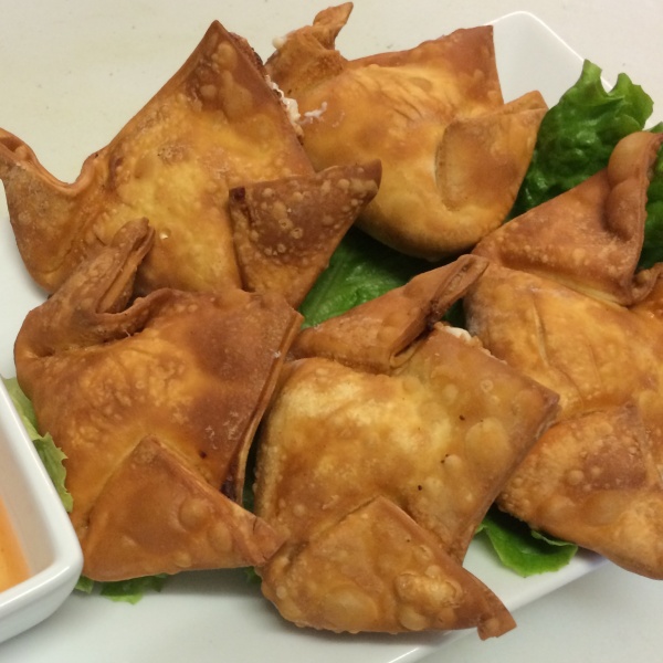 Order 5 Crab Rangoons food online from Thai Tea Asian Fusion Cafe  store, Irving on bringmethat.com