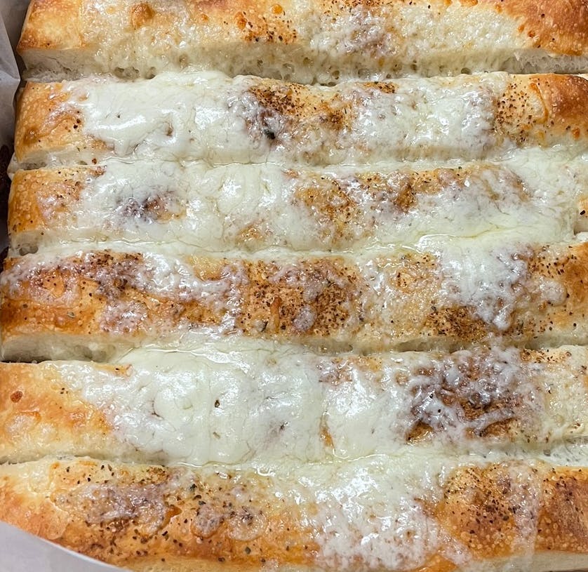 Order Breadsticks with Cheese - Small food online from Papa D's Pizza store, St Clairsville on bringmethat.com