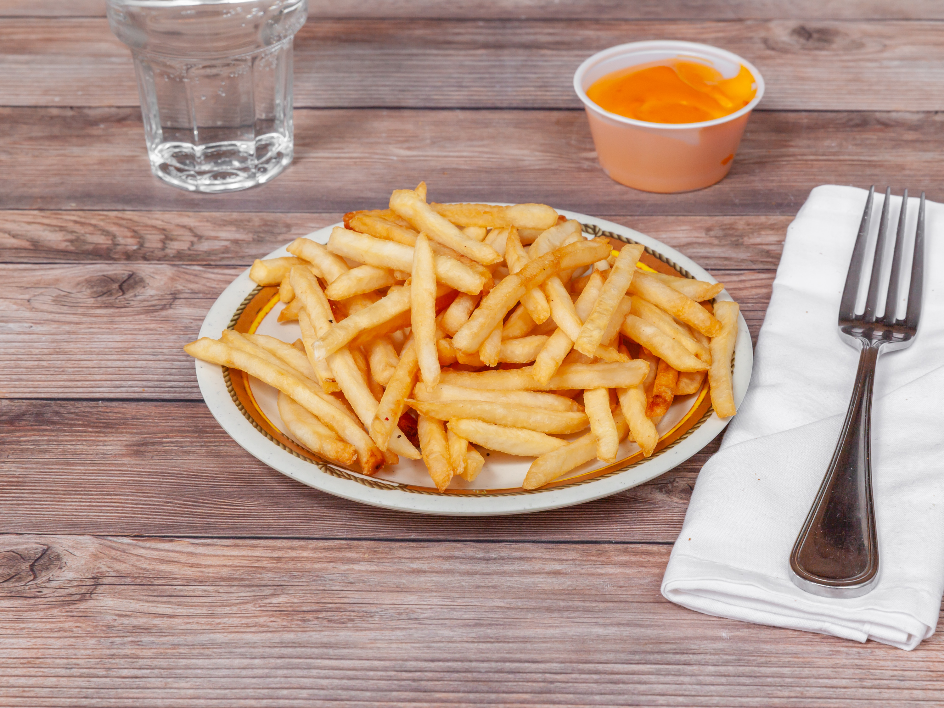 Order French Fries food online from Village Pizza & Pub store, Carpentersville on bringmethat.com