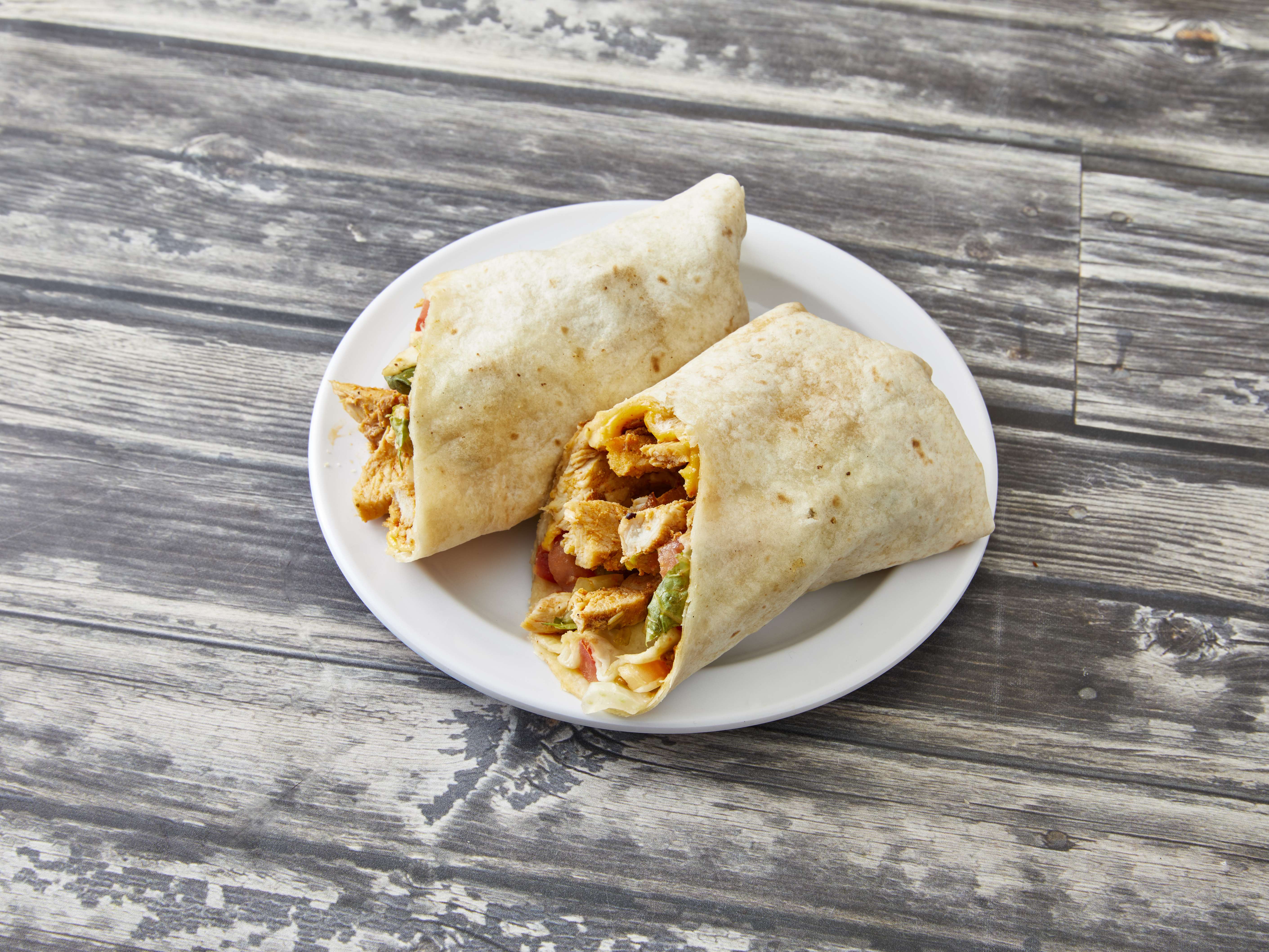 Order Grilled Chicken Wrap food online from Manhattan Deli 2 store, Southfield on bringmethat.com