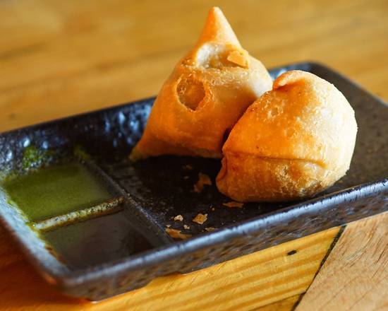 Order Veg Samosa (2 pcs) food online from Inchin Bamboo Garden store, North Olmsted on bringmethat.com