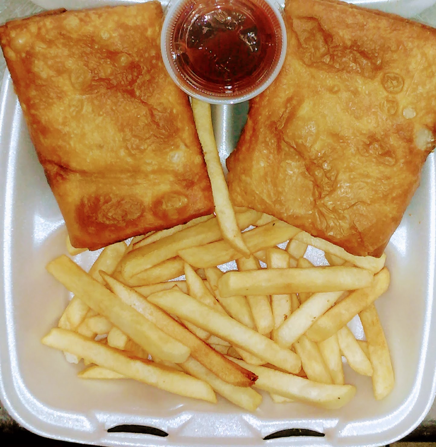 Order  2 Pizza Puffs with one fries & one pop food online from Nadia Fish & Chicken store, Chicago on bringmethat.com