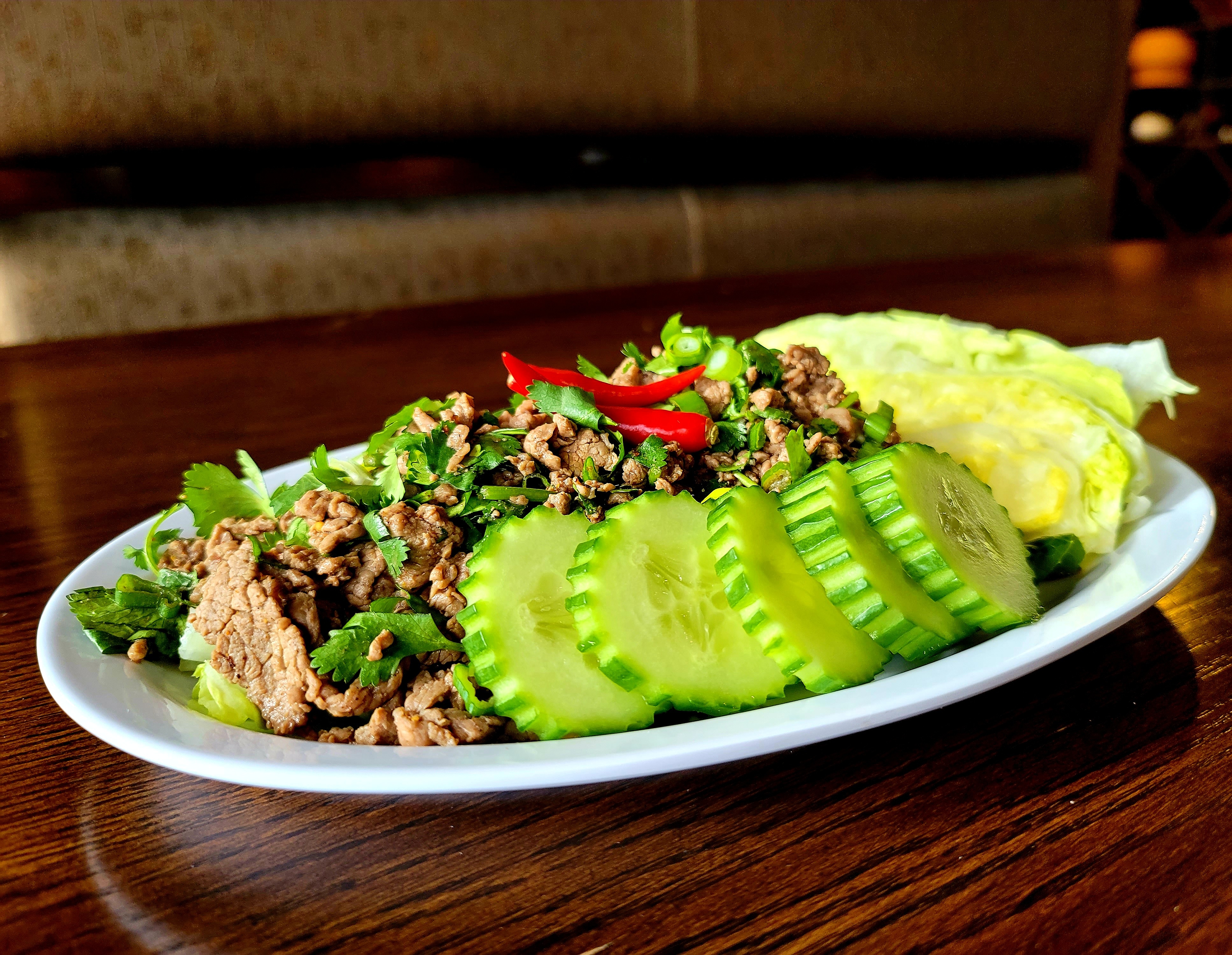 Order Laap Sein (Beef) and Sticky Rice food online from Charming Elephant store, Baltimore on bringmethat.com