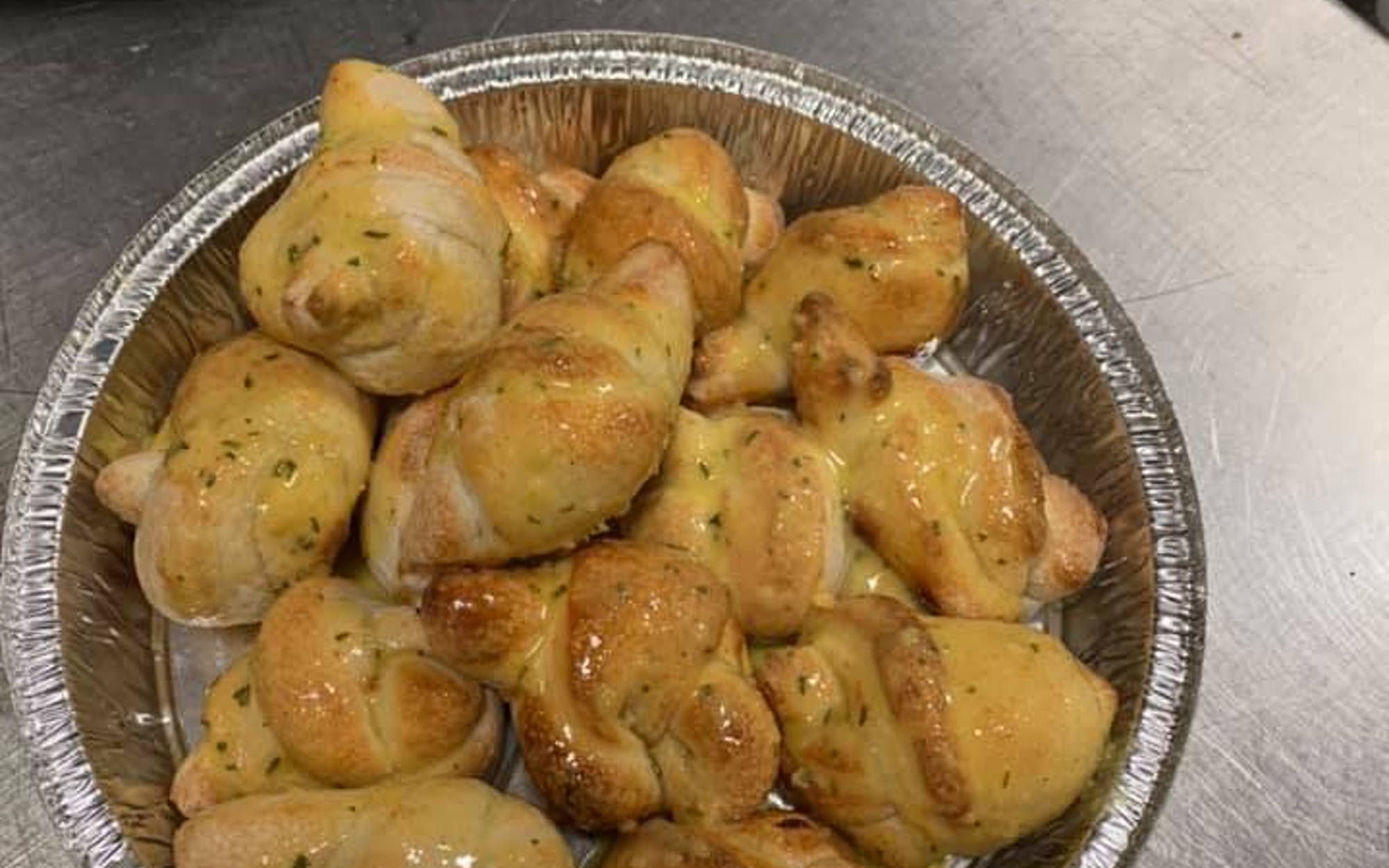 Order Garlic Knots food online from Wings Over Syracuse store, Syracuse on bringmethat.com